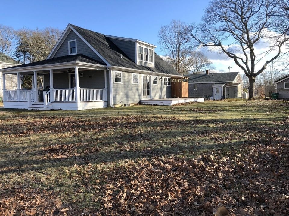 Back & side yards (driveway on other side of house). Includes patio furniture.