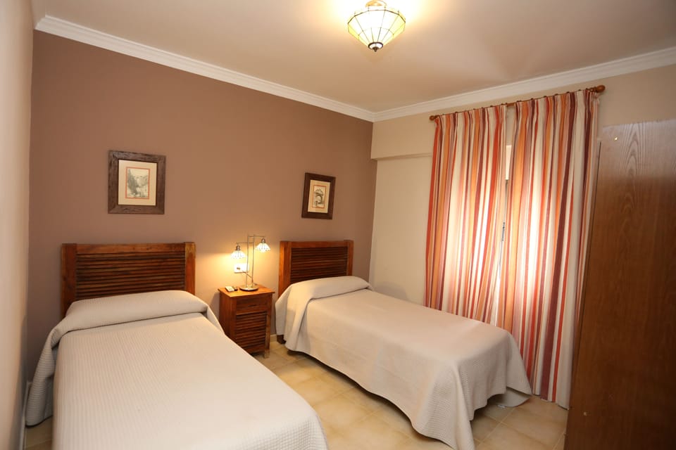 Standard Twin Room, City View | Desk, soundproofing, free cribs/infant beds, rollaway beds