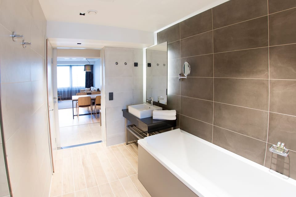 Junior Suite, 1 King Bed (extra bed possibility) | Bathroom | Free toiletries, hair dryer, towels, soap