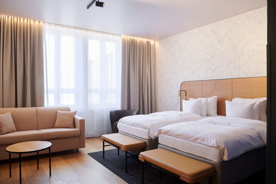 Twin Room (Solo Up, extra bed possibility) | 1 bedroom, minibar, in-room safe, blackout drapes
