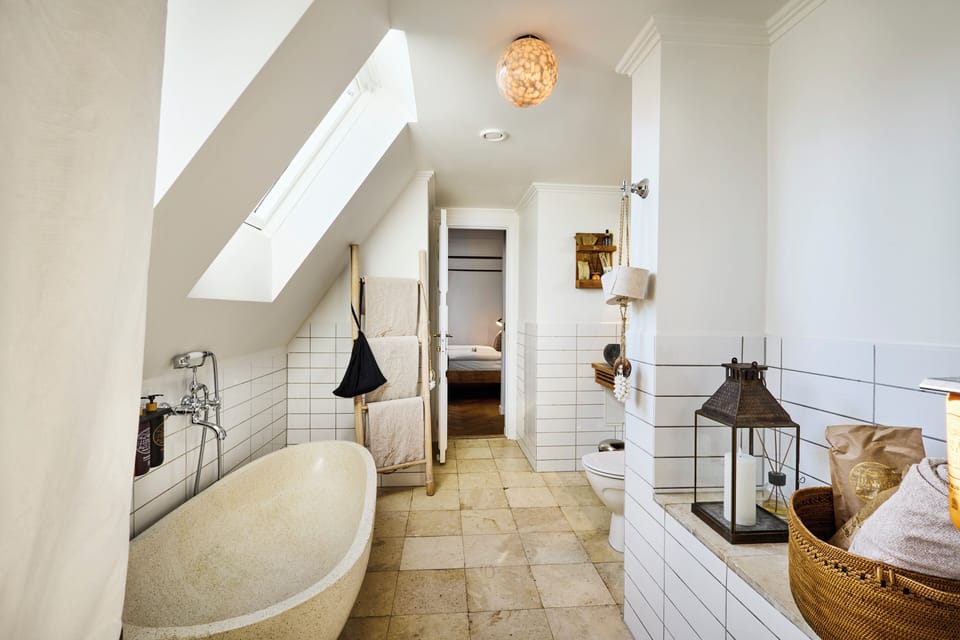 Panoramic Penthouse, 1 Queen Bed, Hot Tub, City View | Bathroom | Designer toiletries, hair dryer, towels, soap