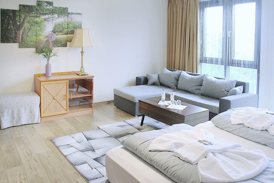 Premium bedding, pillowtop beds, desk, blackout drapes