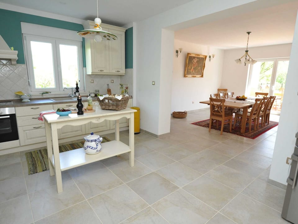 Villa | Private kitchen | Stovetop, dishwasher, highchair, cookware/dishes/utensils