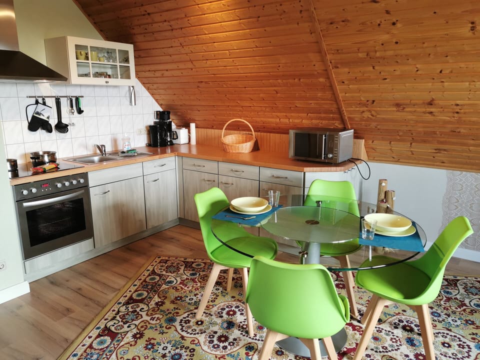 Apartment | Private kitchen | Fridge, highchair