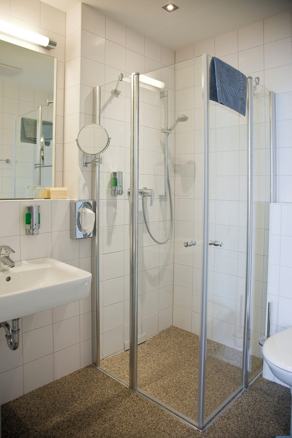 Shower, free toiletries, hair dryer, towels
