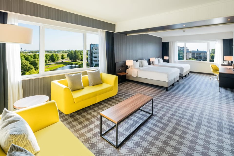 Family Room | Hypo-allergenic bedding available, minibar, in-room safe, desk