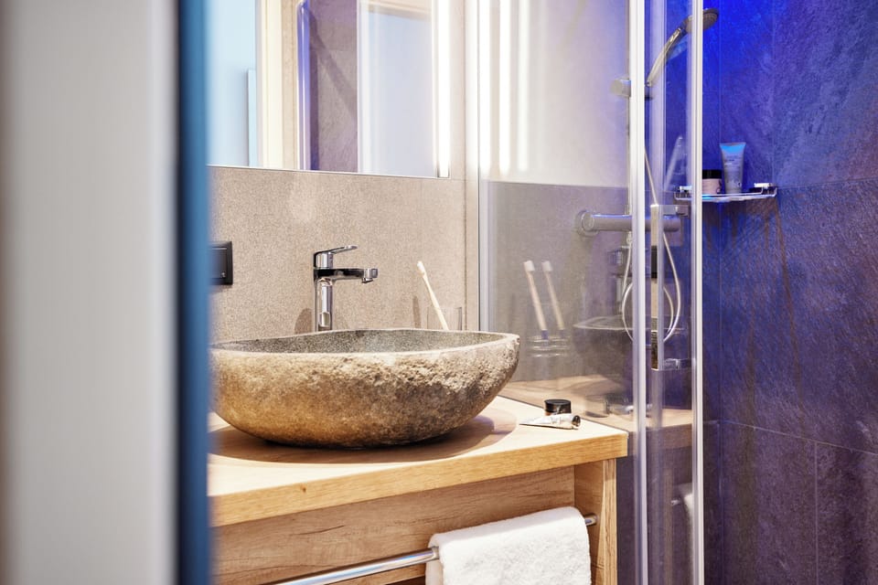 Happy Surprise Room | Bathroom | Shower, hair dryer, bathrobes, towels
