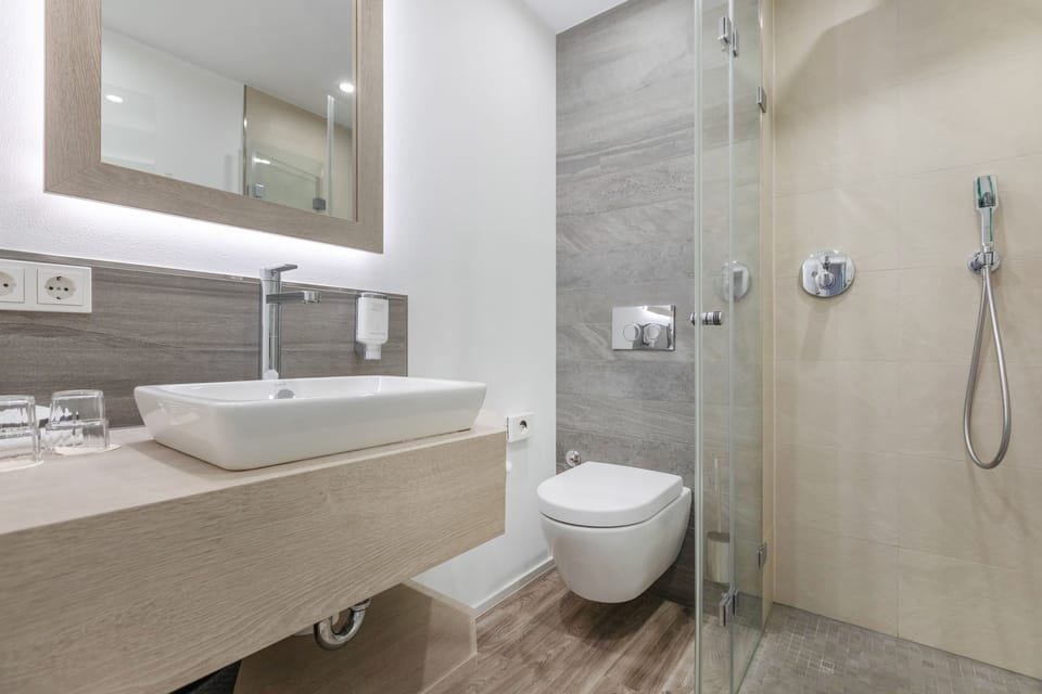 Shower, free toiletries, hair dryer, towels