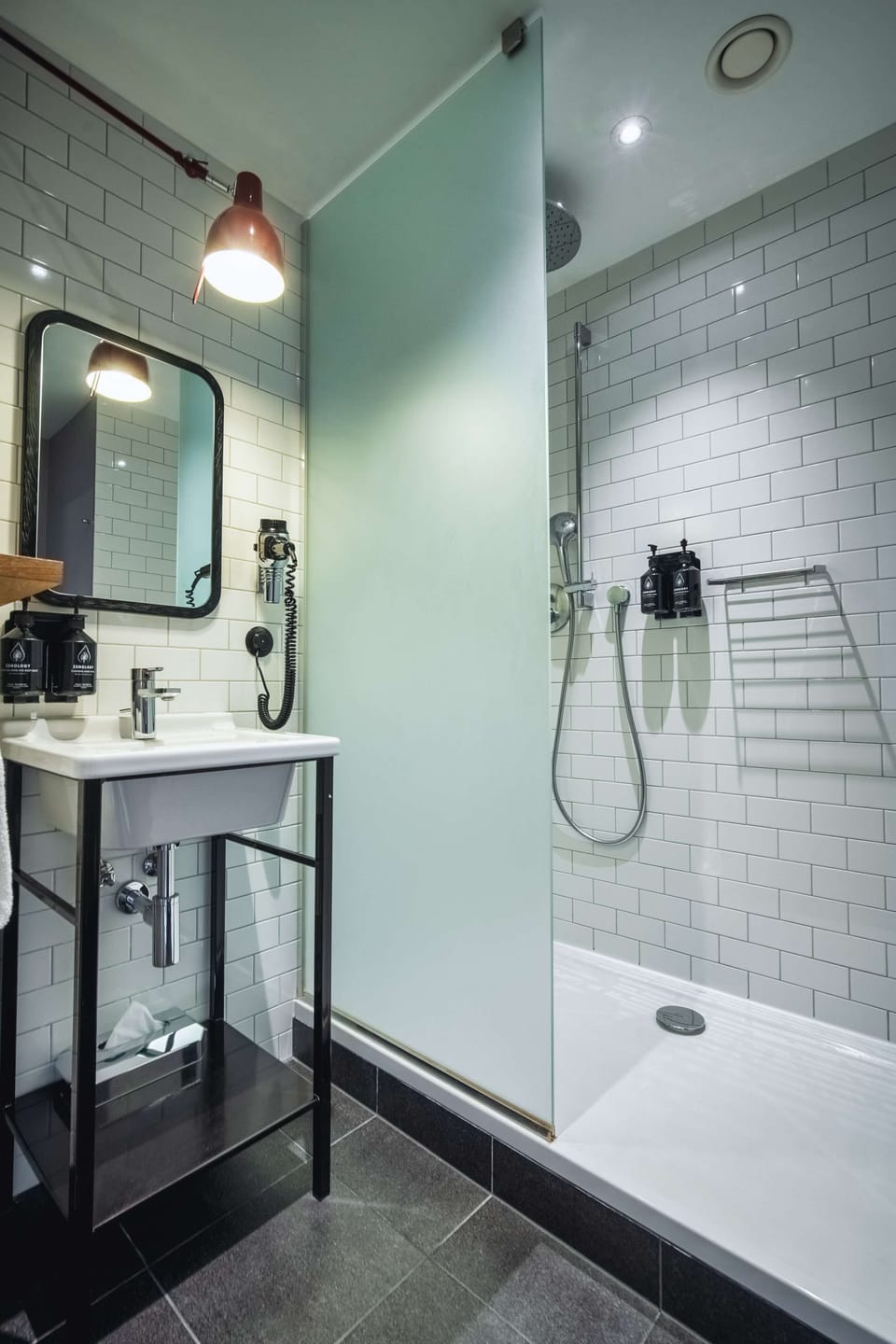 Shower, rainfall showerhead, designer toiletries, hair dryer