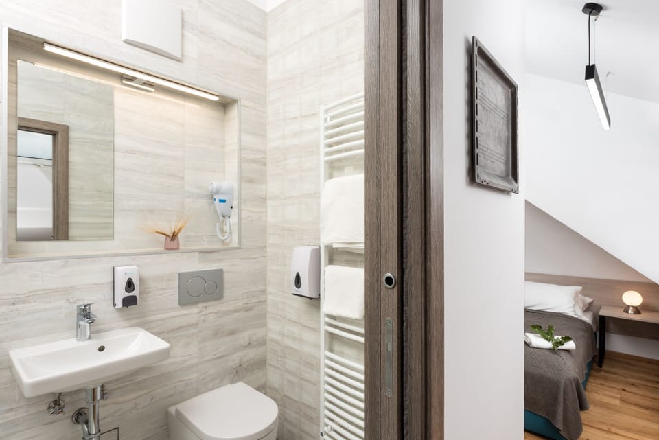 Romantic Double Room, 1 Queen Bed | Bathroom | Shower, rainfall showerhead, hair dryer, heated floors (bathroom)