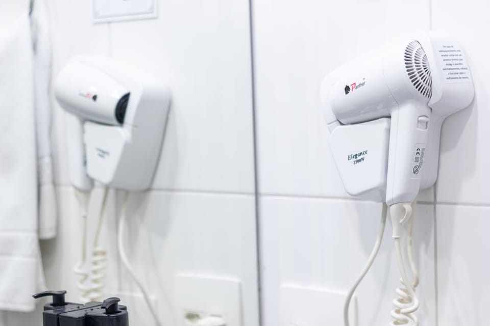Family Quadruple Room | Bathroom | Shower, free toiletries, hair dryer, towels