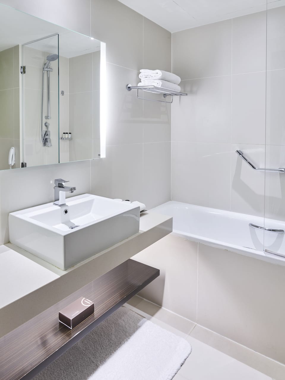 Deep soaking tub, designer toiletries, hair dryer, bathrobes
