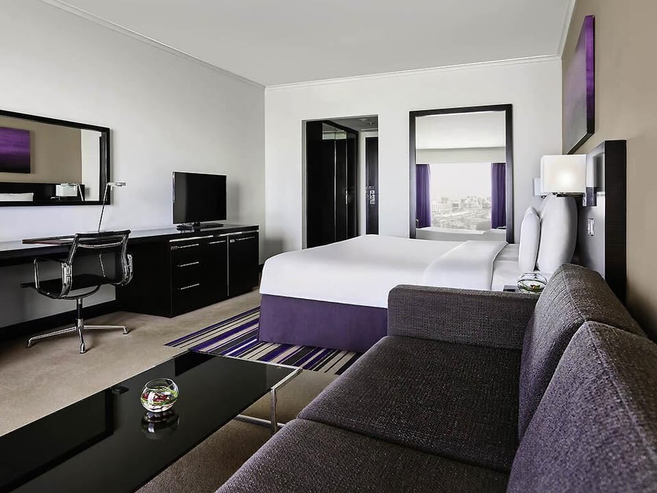 Family Room, 1 King Bed | Down comforters, in-room safe, individually furnished, desk