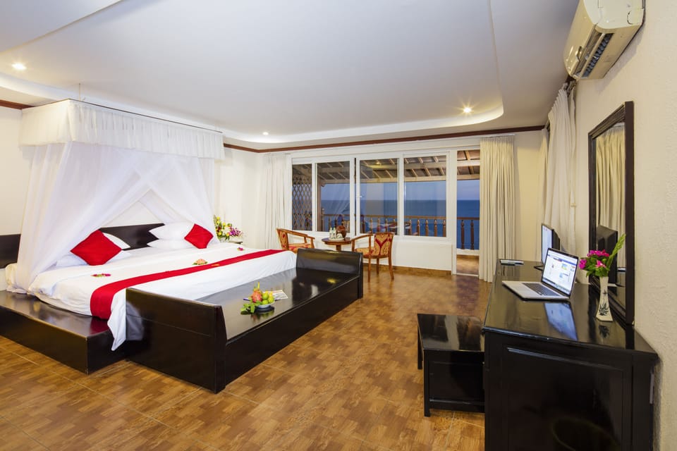 Deluxe Villa, Beachfront | Down comforters, minibar, in-room safe, desk