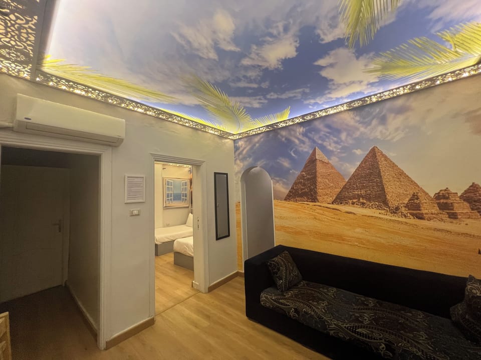 Family Apartment, 1 Bedroom | Living area | 32-inch LCD TV with satellite channels, TV