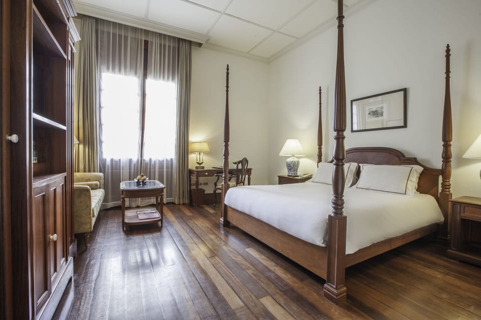 Deluxe Double Room, 1 King Bed, Pool View | Minibar, in-room safe, desk, laptop workspace