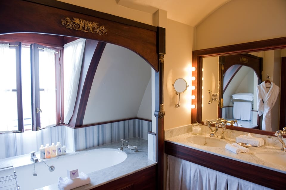 Combined shower/tub, free toiletries, hair dryer, bathrobes