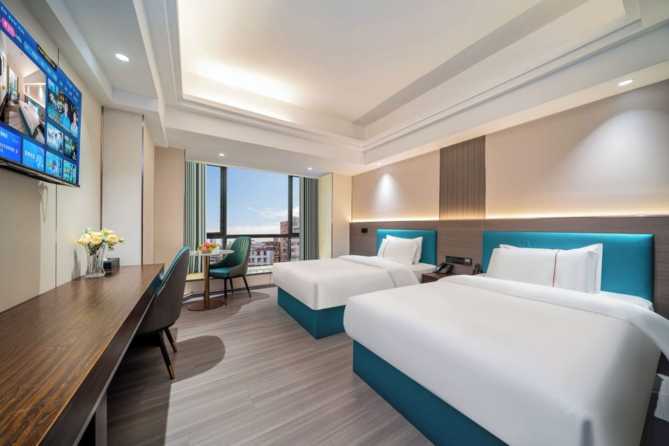 Comfort Twin Room | Premium bedding, laptop workspace, blackout drapes, soundproofing
