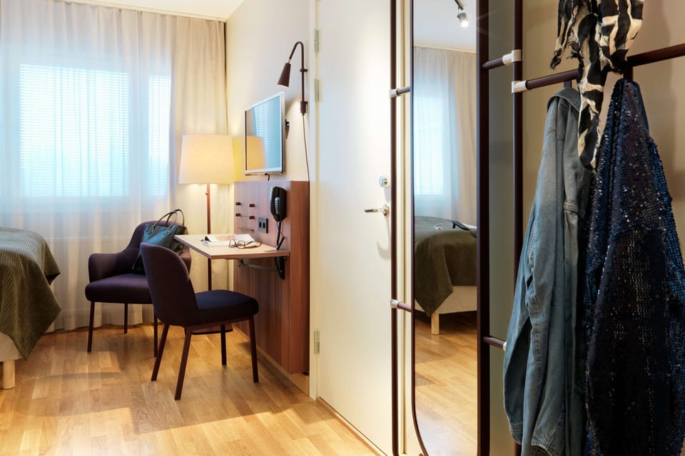 Family Room (Three) | Desk, laptop workspace, blackout drapes, iron/ironing board