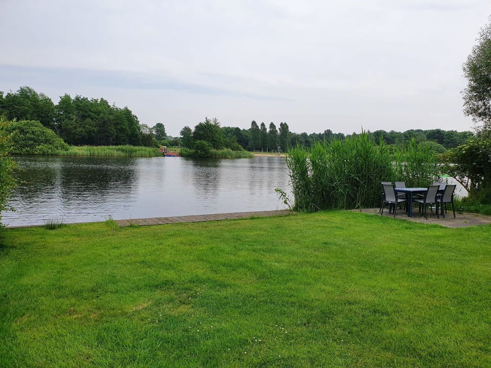Water, Cloud, Sky, Plant, Natural Landscape, Tree, Land Lot, Lake, Bank