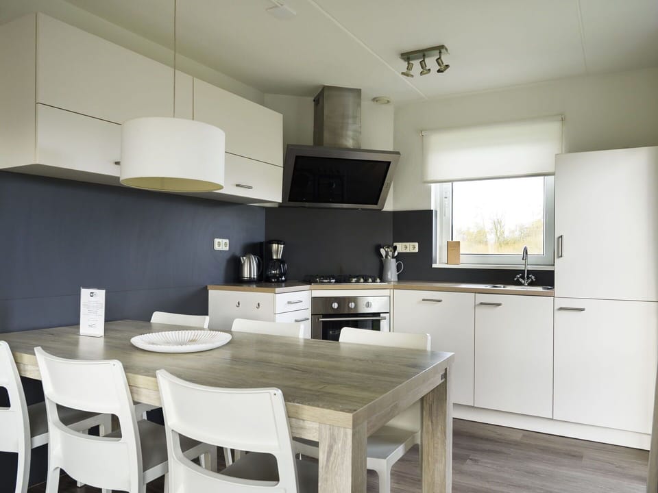 Furniture, Cabinetry, Property, Countertop, Kitchen, Table, Interior Design, Wood, Flooring, Home Appliance