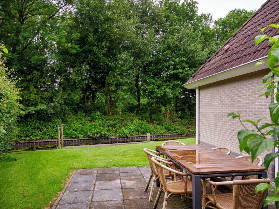 Furniture, Outdoor Furniture, Shrub, Garden, Shade, Land Lot, Lawn, Outdoor Table, Groundcover