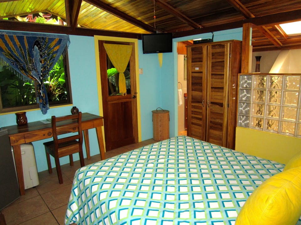Honeymoon Bungalow, 1 Double Bed, Garden Area | Living area | Flat-screen TV