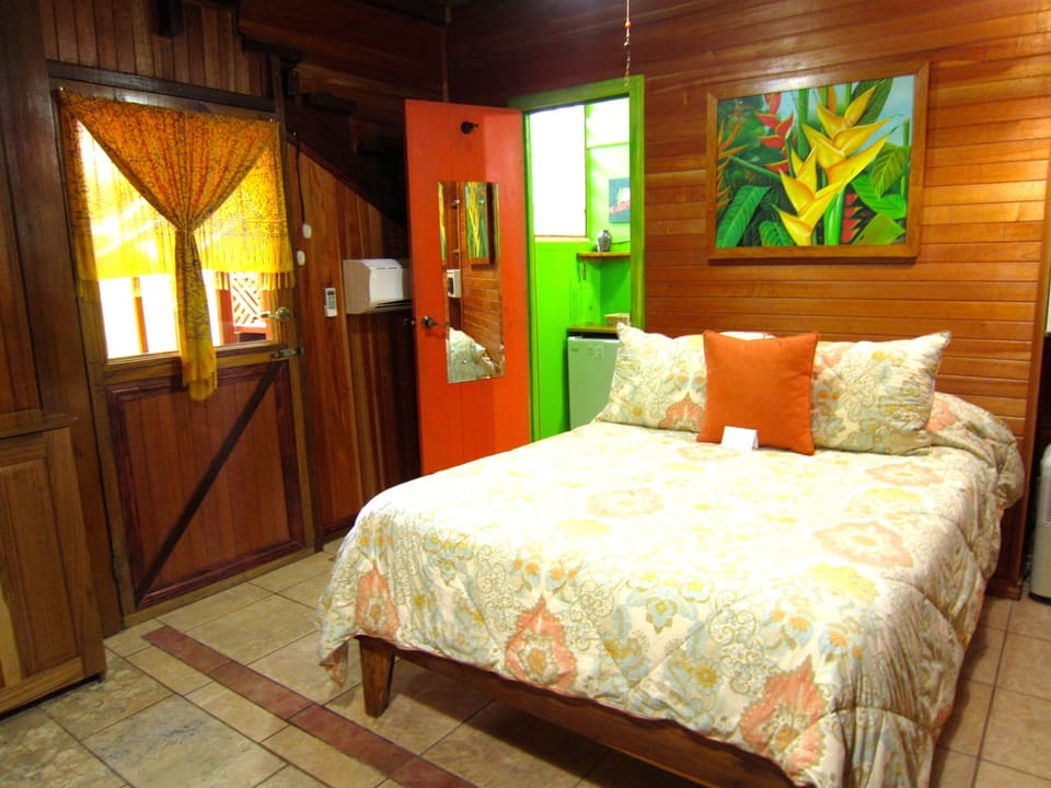 Standard Double Room, 1 Double Bed, Garden Area | Living area | Flat-screen TV