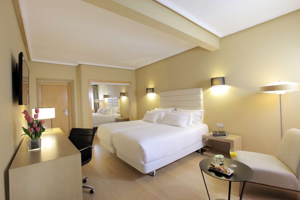 Superior Room | Minibar, in-room safe, desk, blackout drapes