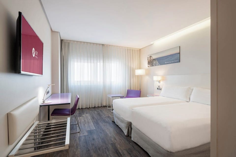 Double or Twin Room | Down comforters, minibar, in-room safe, desk