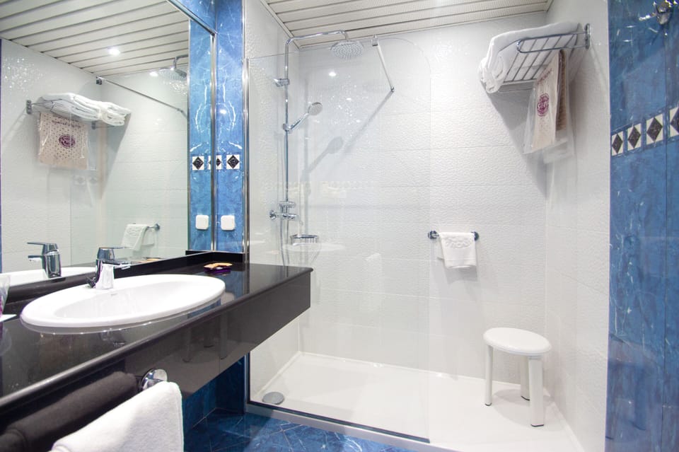 Family Room, Terrace, Sea View | Bathroom | Shower, hair dryer, bidet, towels