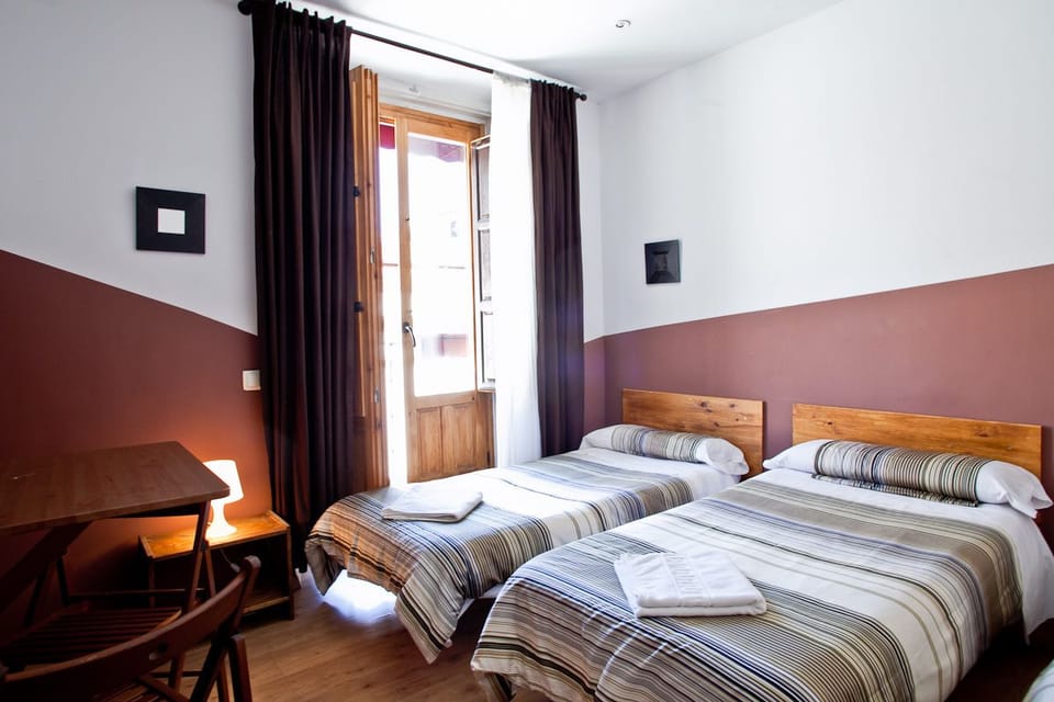 Twin Room, Shared Bathroom | Iron/ironing board, free WiFi, bed sheets