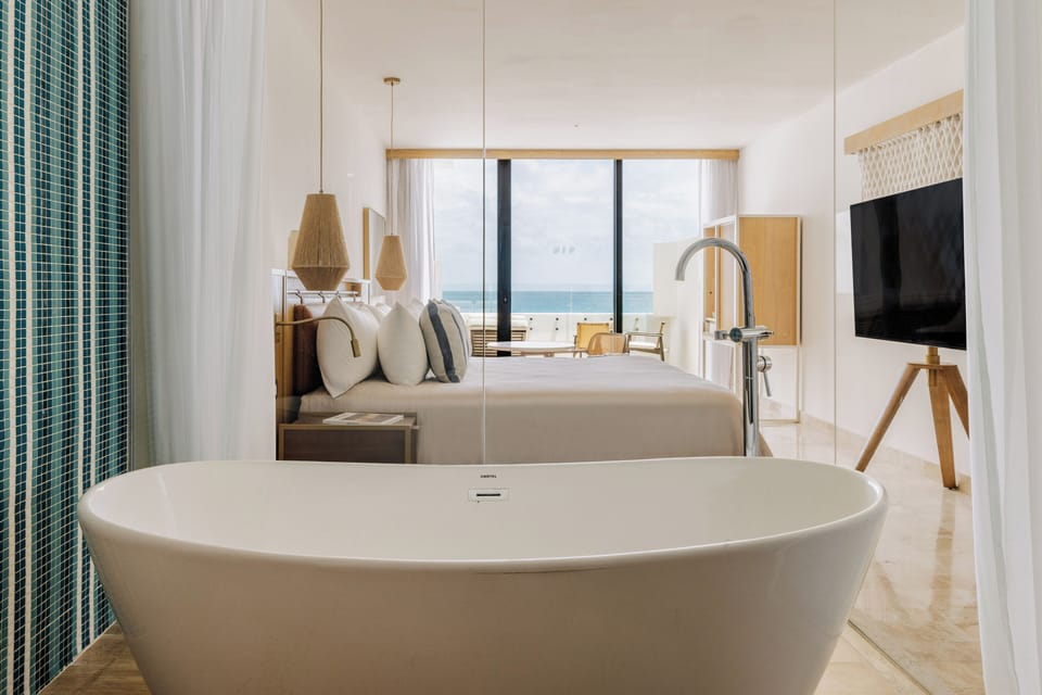 The Reserve Adults Only  Suite - Ocean View | Bathroom | Shower, rainfall showerhead, eco-friendly toiletries, hair dryer
