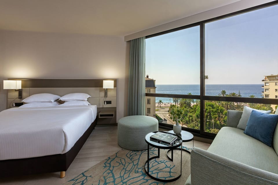 Junior Room, 1 King Bed with Sofa bed, Sea View | Living area | 107-cm flat-screen TV with satellite channels, TV