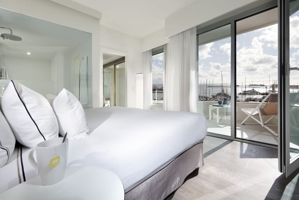Premium Room, Sea View (The Level Grand) | Minibar, desk, iron/ironing board, free cribs/infant beds