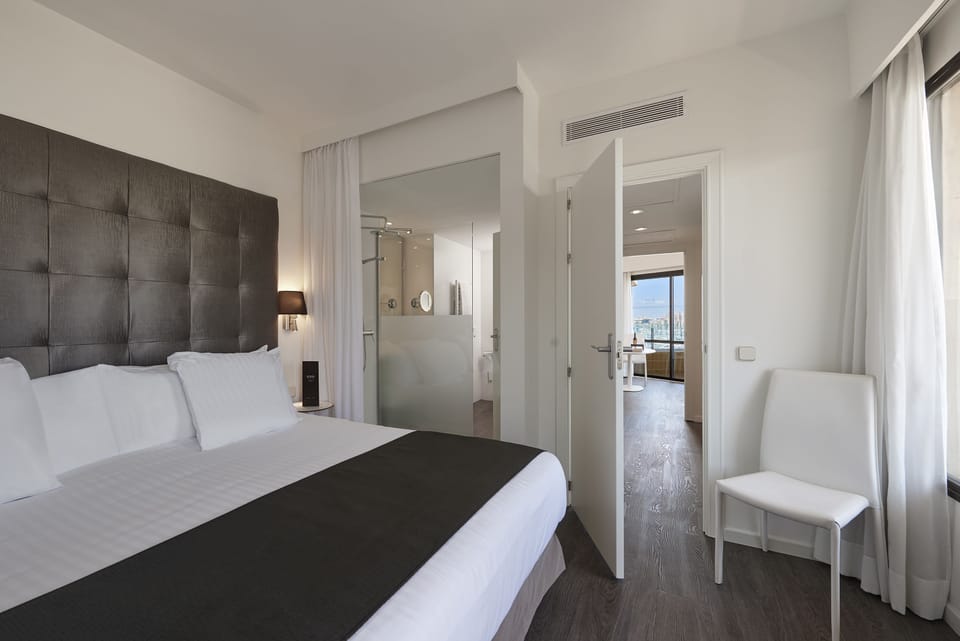 Premium Room, Sea View (The Level Grand) | Minibar, desk, iron/ironing board, free cribs/infant beds