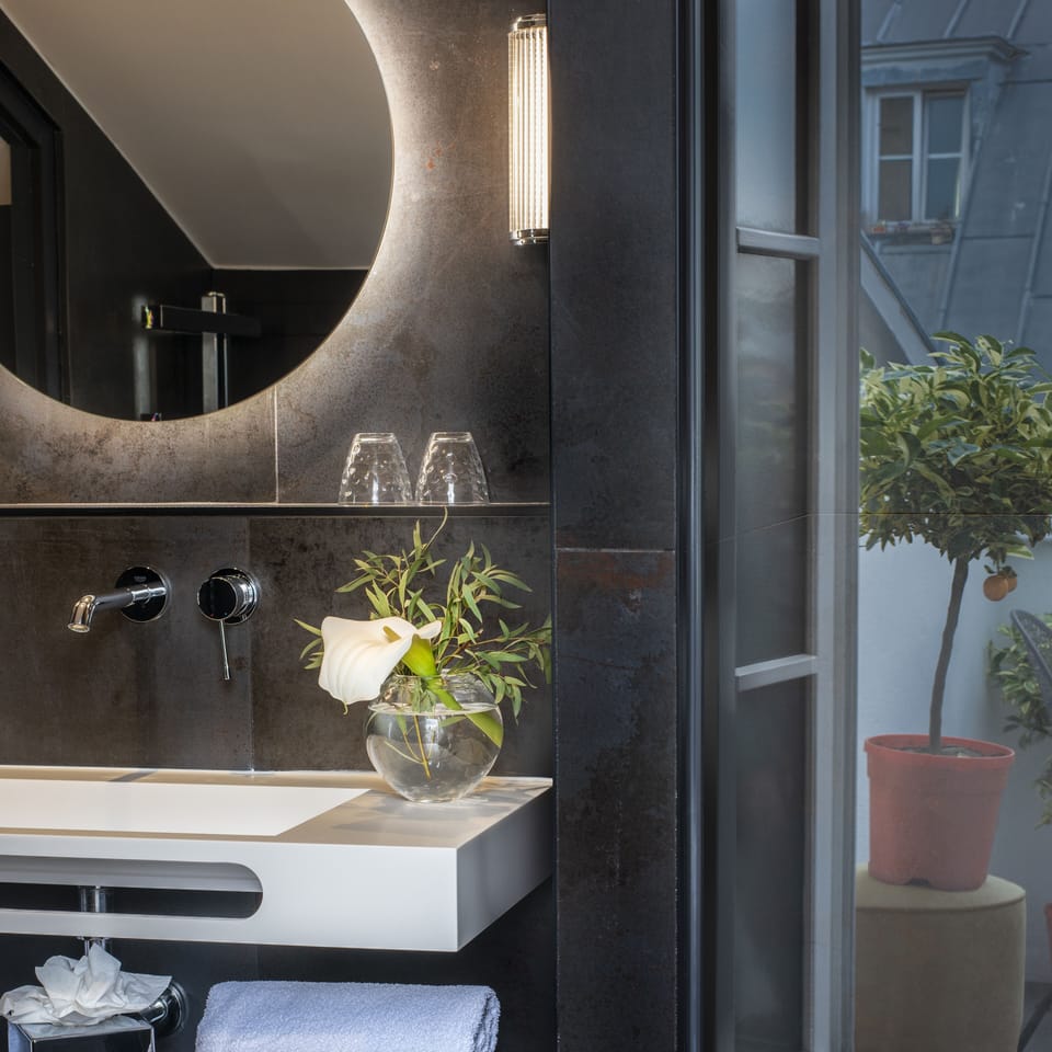 Designer toiletries, hair dryer, bathrobes, slippers