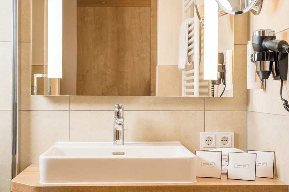 Hair dryer, towels, soap, shampoo