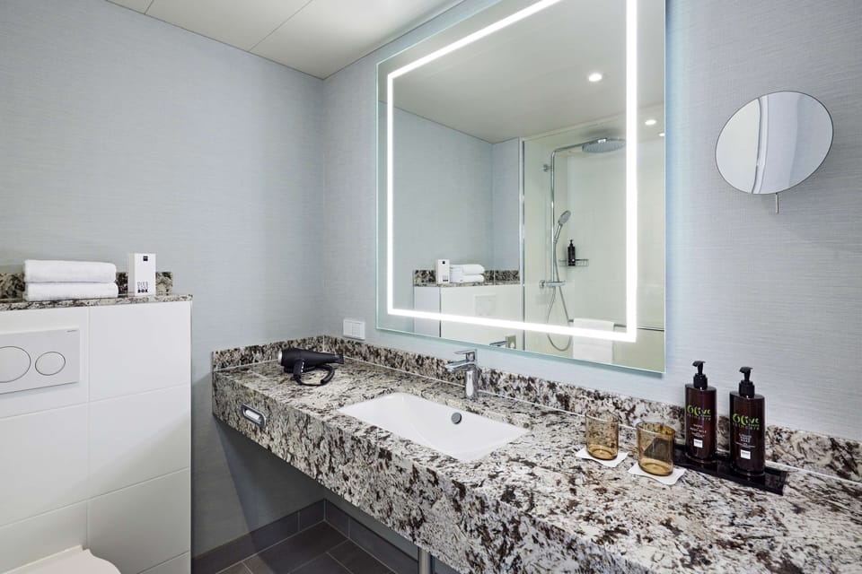 Shower, free toiletries, hair dryer, towels