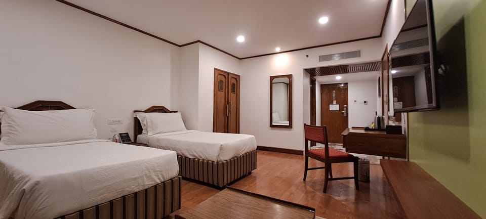 Egyptian cotton sheets, premium bedding, minibar, in-room safe