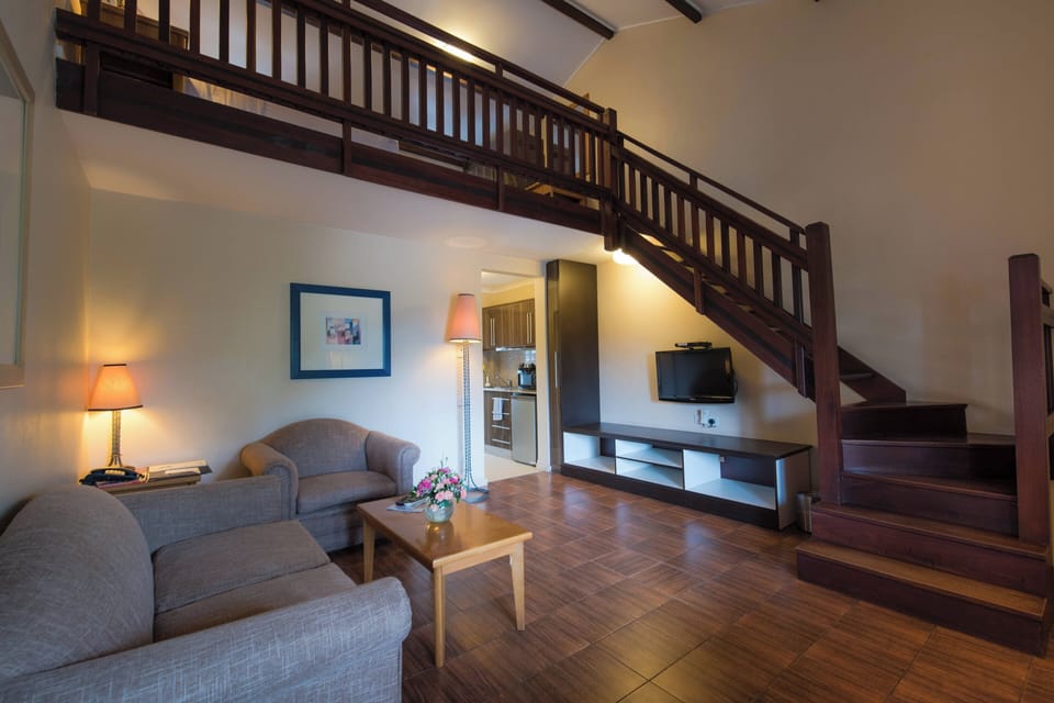 Loft, 1 Bedroom | Living area | 32-inch LCD TV with satellite channels, TV