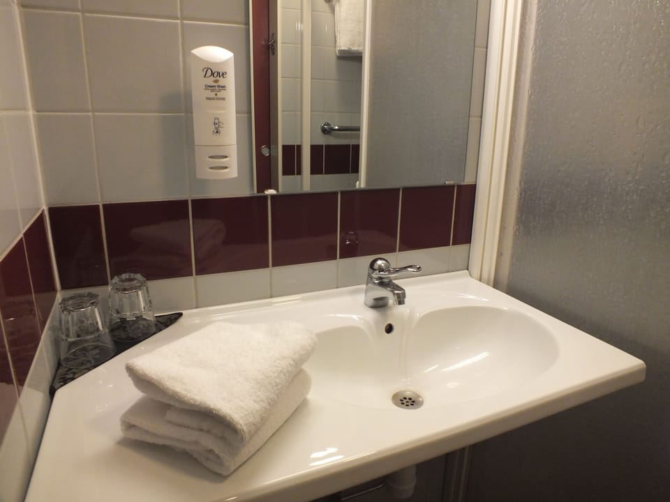 Shower, free toiletries, hair dryer, towels