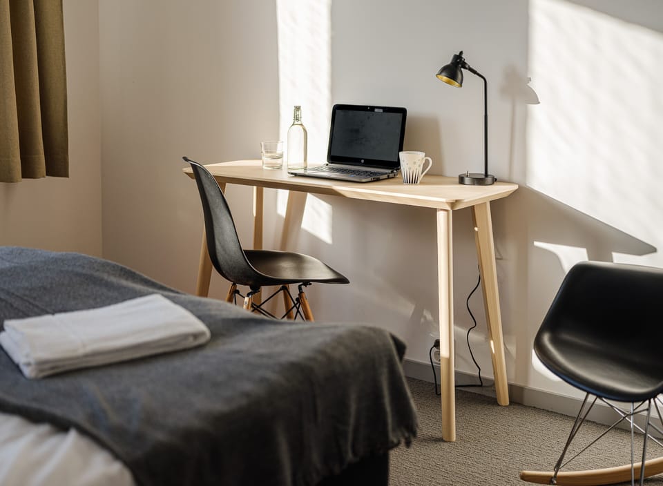 Hypo-allergenic bedding available, desk, laptop workspace