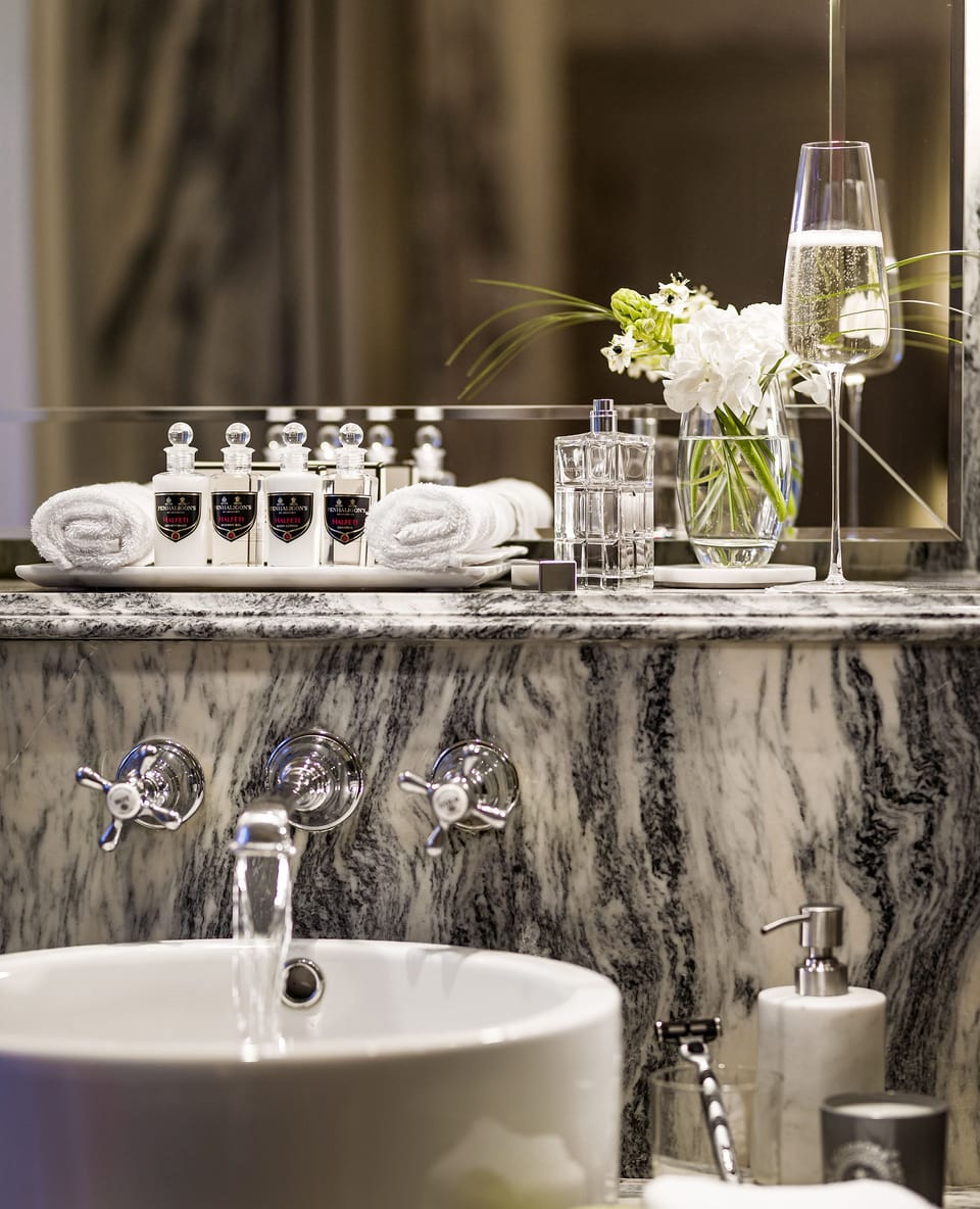 Executive Room | Bathroom | Designer toiletries, hair dryer, bathrobes, slippers