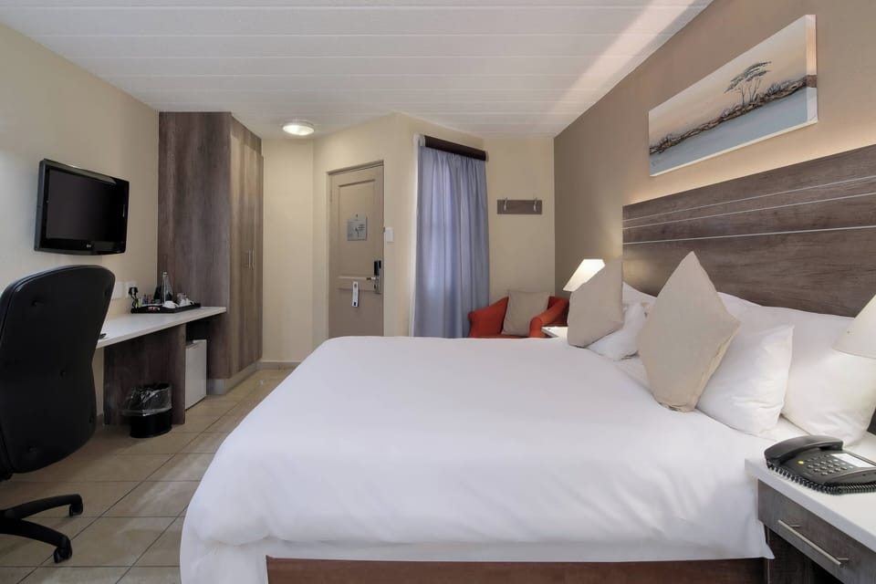 Premium bedding, down comforters, Select Comfort beds, minibar