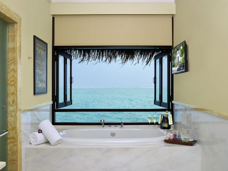 Rehendhi Presidential Overwater Suite - Two Bedroom with Pool | Bathroom | Separate tub and shower, rainfall showerhead, designer toiletries