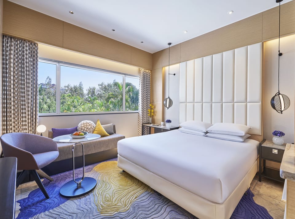 Premium Room, 1 King Bed | Premium bedding, down comforters, minibar, in-room safe