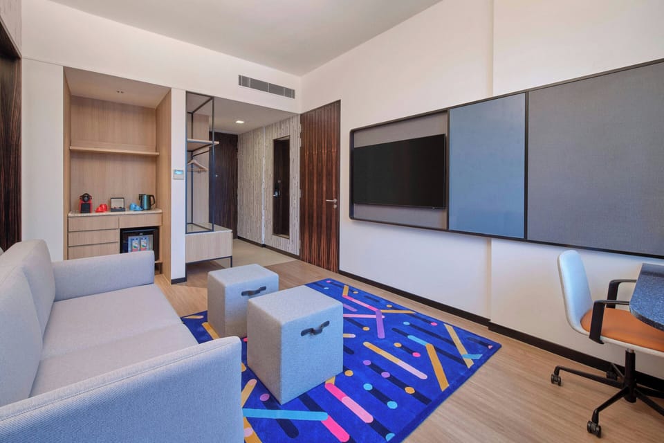 Suite, 1 Bedroom | Living area | 55-inch LCD TV with cable channels, TV