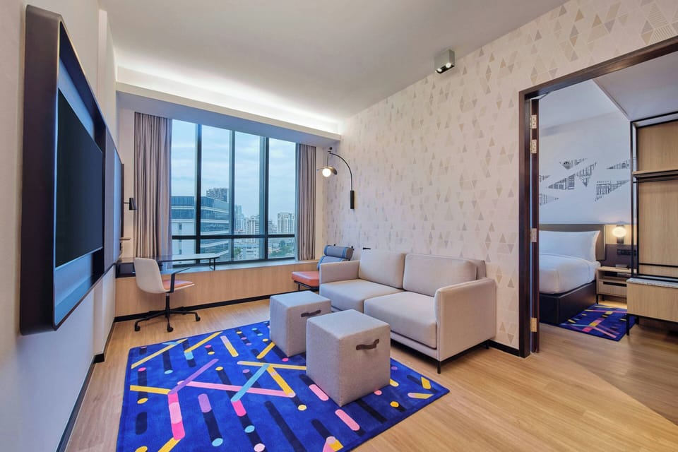 Suite, 1 Bedroom | Living area | 55-inch LCD TV with cable channels, TV