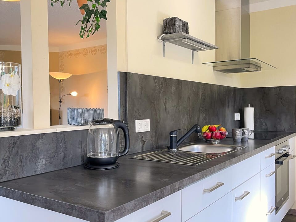 Apartment | Private kitchen | Stovetop, dishwasher, highchair